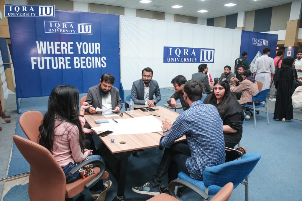 Mr. Muhammad Hussain with Iqra University Students.